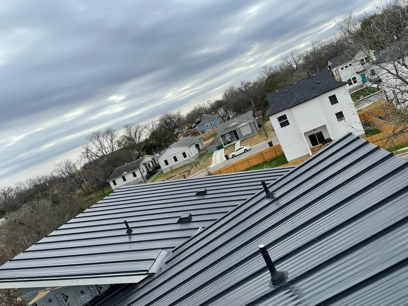Standing seam metal roof panels with vents for Skylight Repair in Robinson